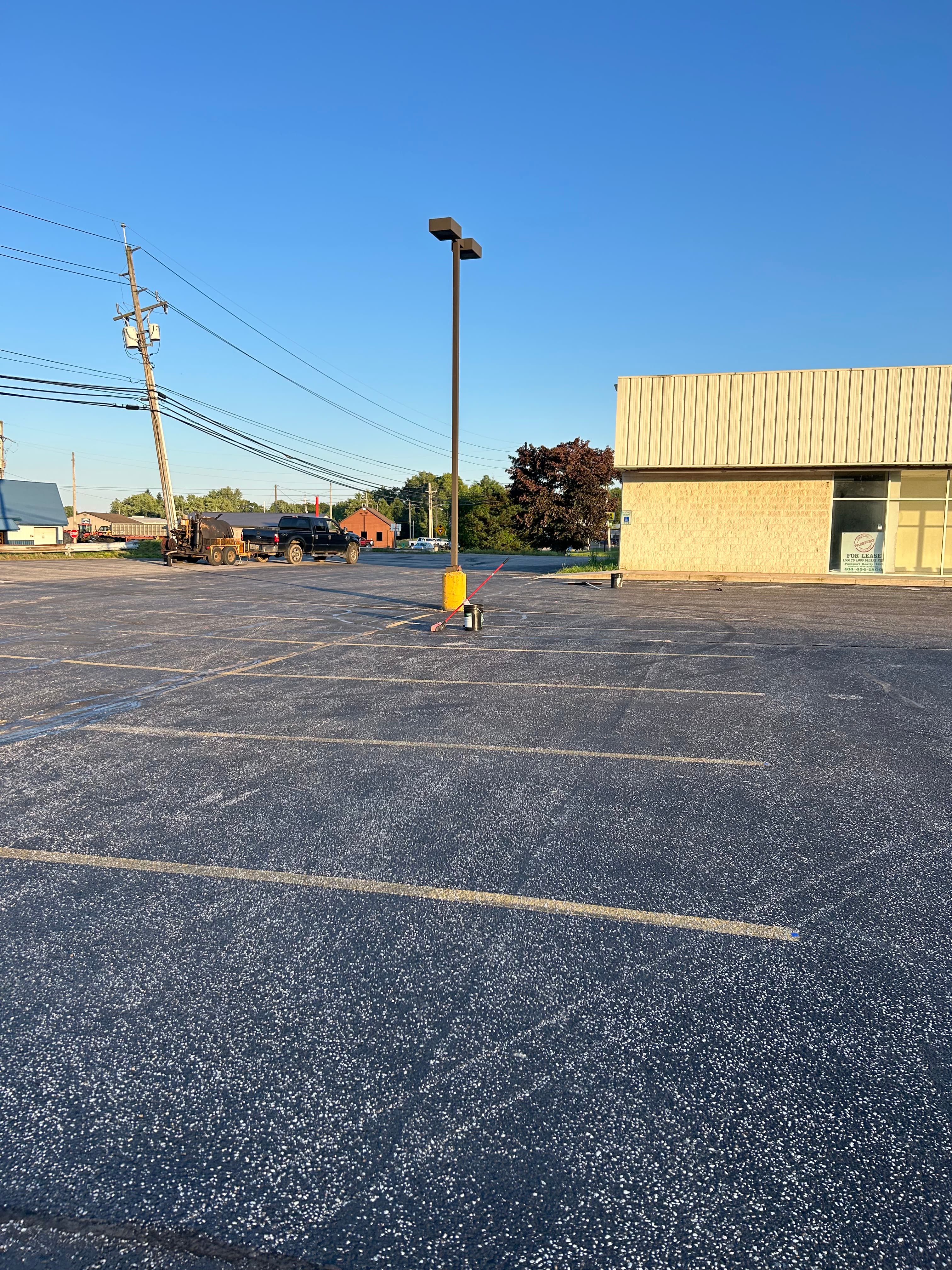 Before sealcoating: Commercial Parking Lot