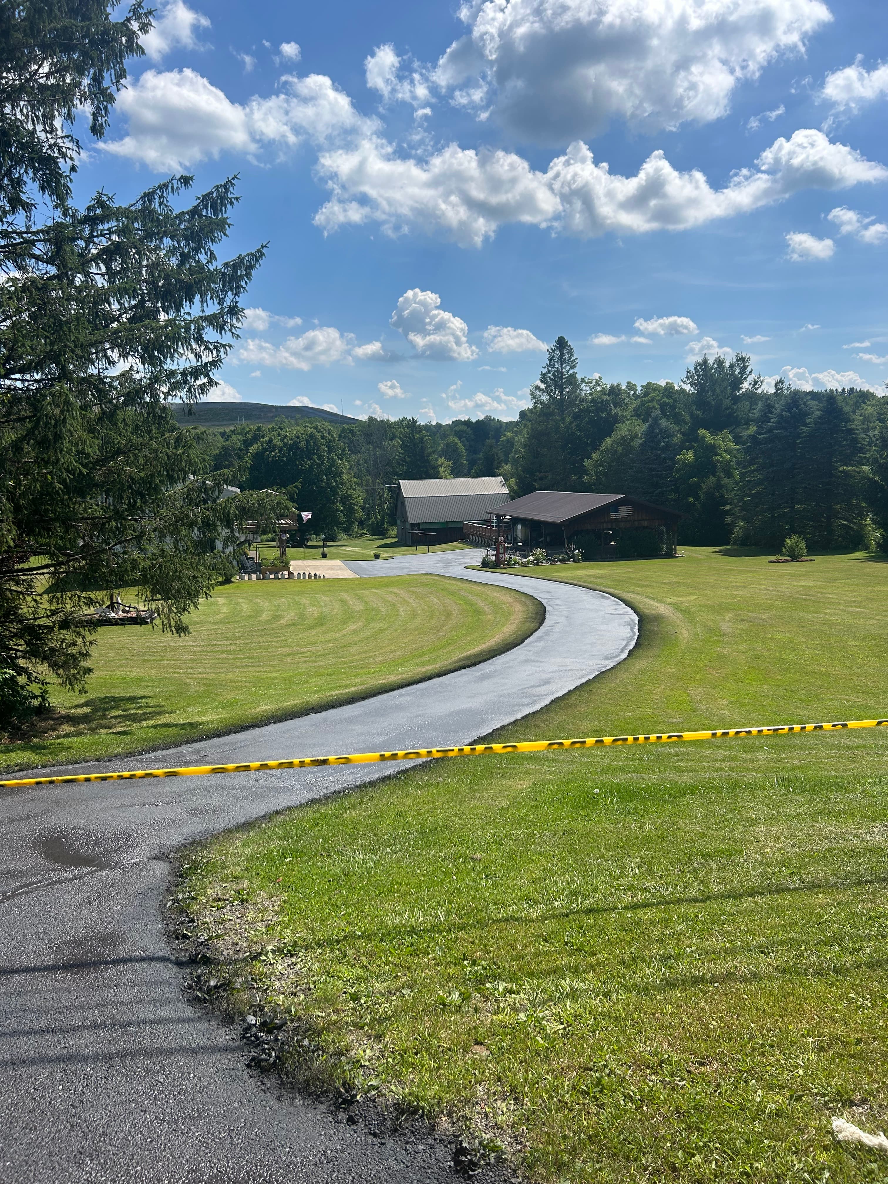 Beautifully sealed winding driveway through rural Northwest Pennsylvania property